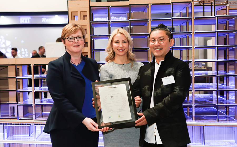3 people holding framed A4 document 3 people holding framed A4 document