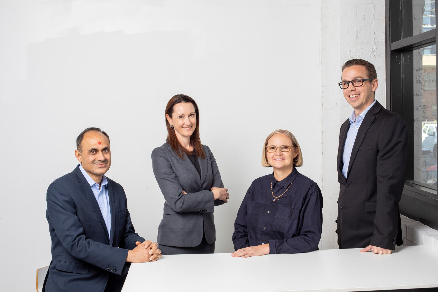 4 people in an office 4 people in an office