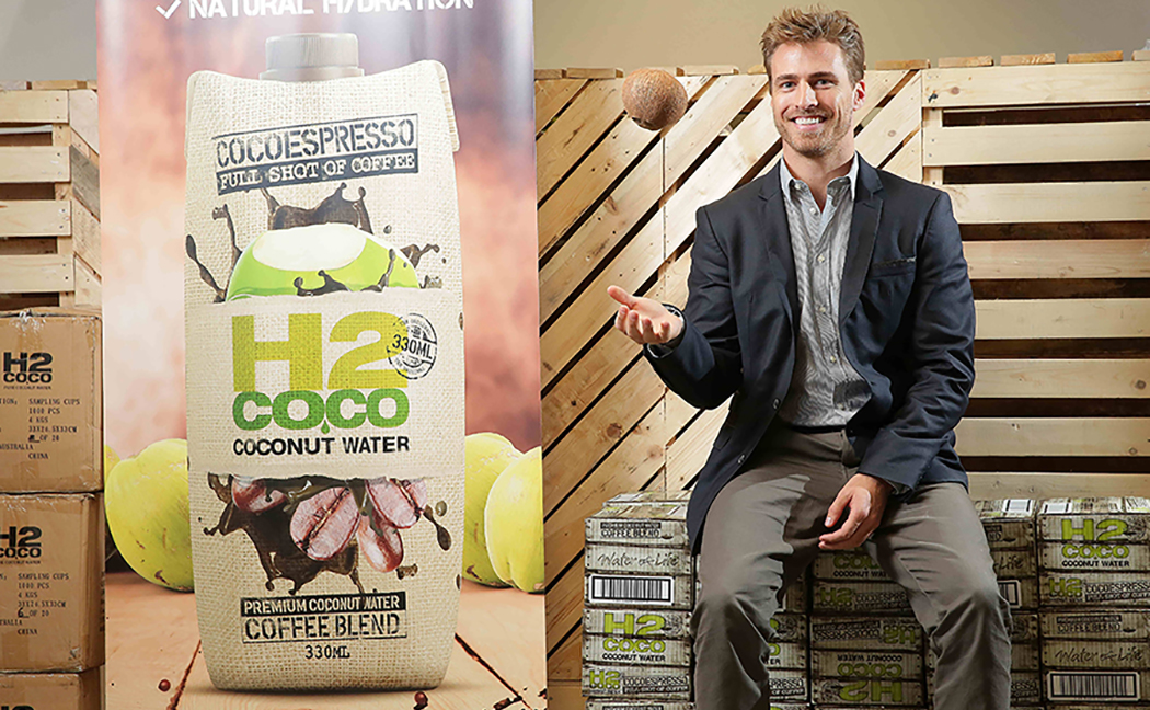 H2coco CEO, David Freeman, catching a coconut H2coco CEO, David Freeman, catching a coconut