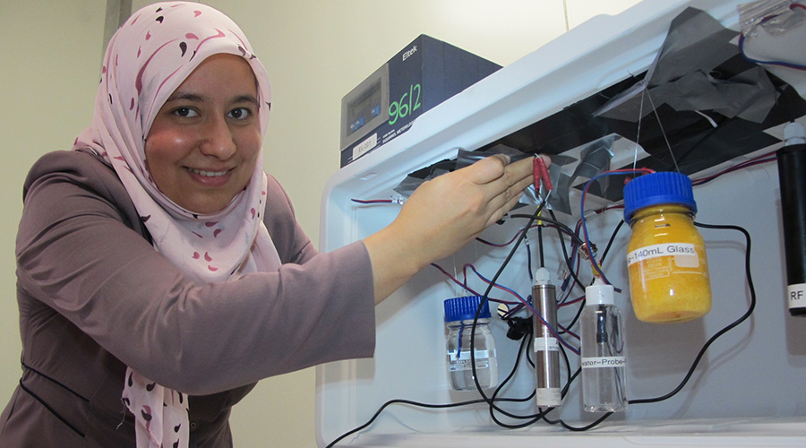 woman working with lab equipment woman working with lab equipment